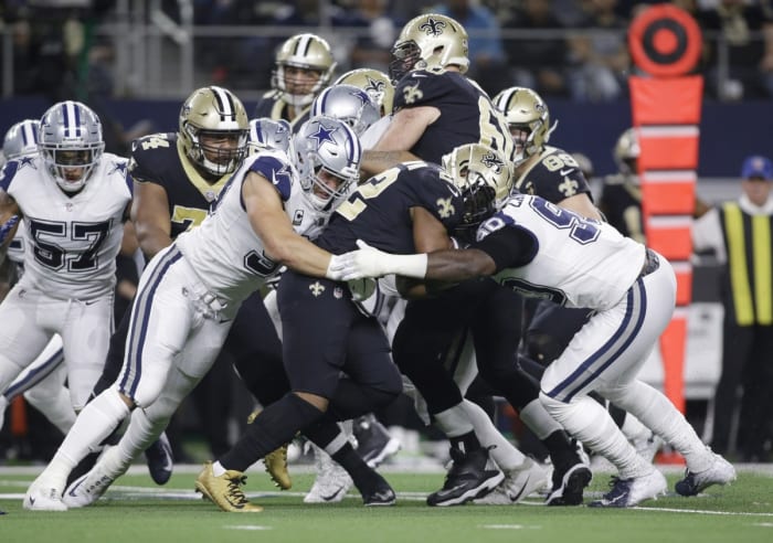 New Orleans Saints running back Mark Ingram (22) is stopped by the Dallas Cowboys defense. Mandatory Credit: Tim Heitman-USA TODAY Sports